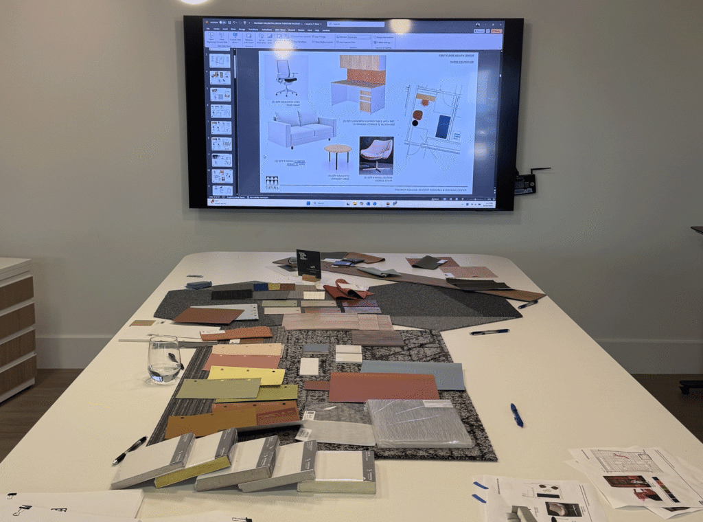 our design space with swatches and samples and a TV showing a rendering
